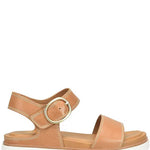 Tan sandal with a gold buckle on a white background