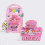 Pink hair clip with unicorn design and 'Lisa Frank' packaging on a white background