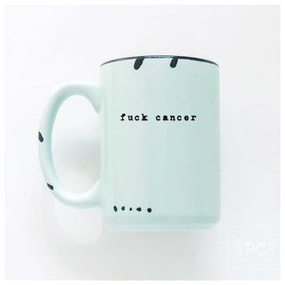 Mint green mug with 'fuck cancer' text on a white background