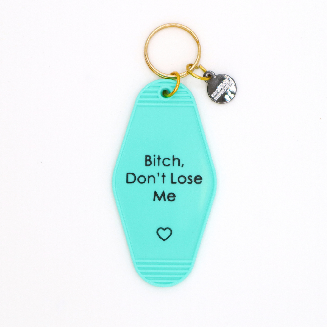 Turquoise keychain with text 'Bitch, Don't Lose Me' on a white background