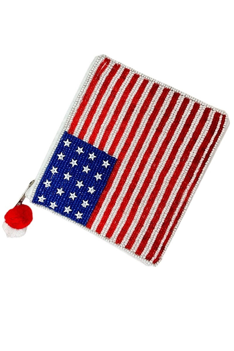 American flag patch with a red pom-pom on a white background