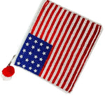 American flag patch with a red pom-pom on a white background