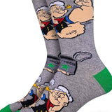 Gray socks with cartoon character design on a white background