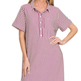 Woman wearing a red and white striped shirt dress on a white background