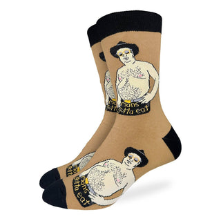 Beige socks with black accents featuring artistic illustrations and text on a white background