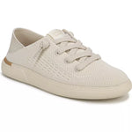 A single low-top sneaker in a light cream or off-white color, featuring a textured perforated mesh upper, matching flat laces, and a thick ribbed sole, shown against a plain white background.