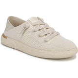 A single low-top sneaker in a light cream or off-white color, featuring a textured perforated mesh upper, matching flat laces, and a thick ribbed sole, shown against a plain white background.