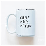 White mug with text 'COFFEE MAKES ME POOP' on a white background