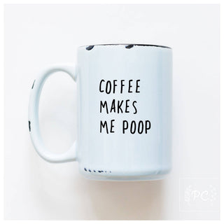 White mug with text 'COFFEE MAKES ME POOP' on a white background