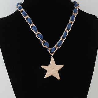 Necklace with blue chain and star pendant on a black mannequin