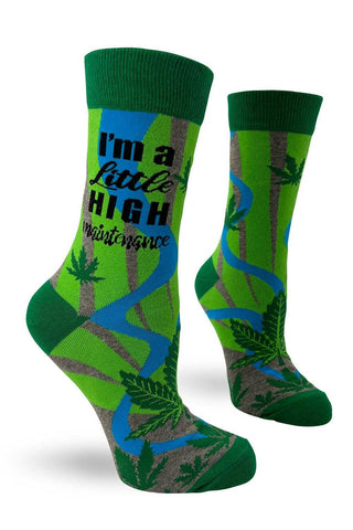 Green socks with leaf patterns and text on a white background