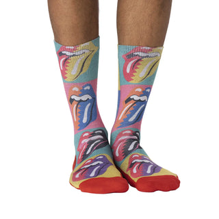 Colorful socks with Rolling Stones logo worn by a person on a white background