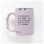 Purple mug with humorous text on a white background