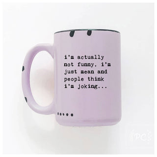 Purple mug with humorous text on a white background