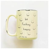Yellow mug with smiley faces and text 'be fucking happy' on a white background