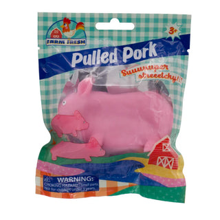 Pink rubber pig toy in packaging with 'Farm Fresh' branding