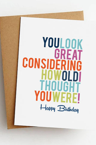 Colorful birthday card with humorous message on a white background