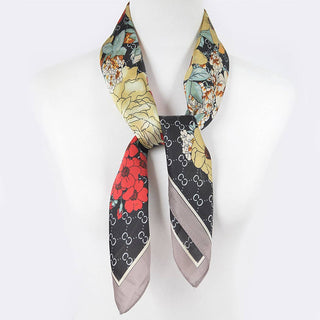 Colorful scarf with floral and patterned design on a white background