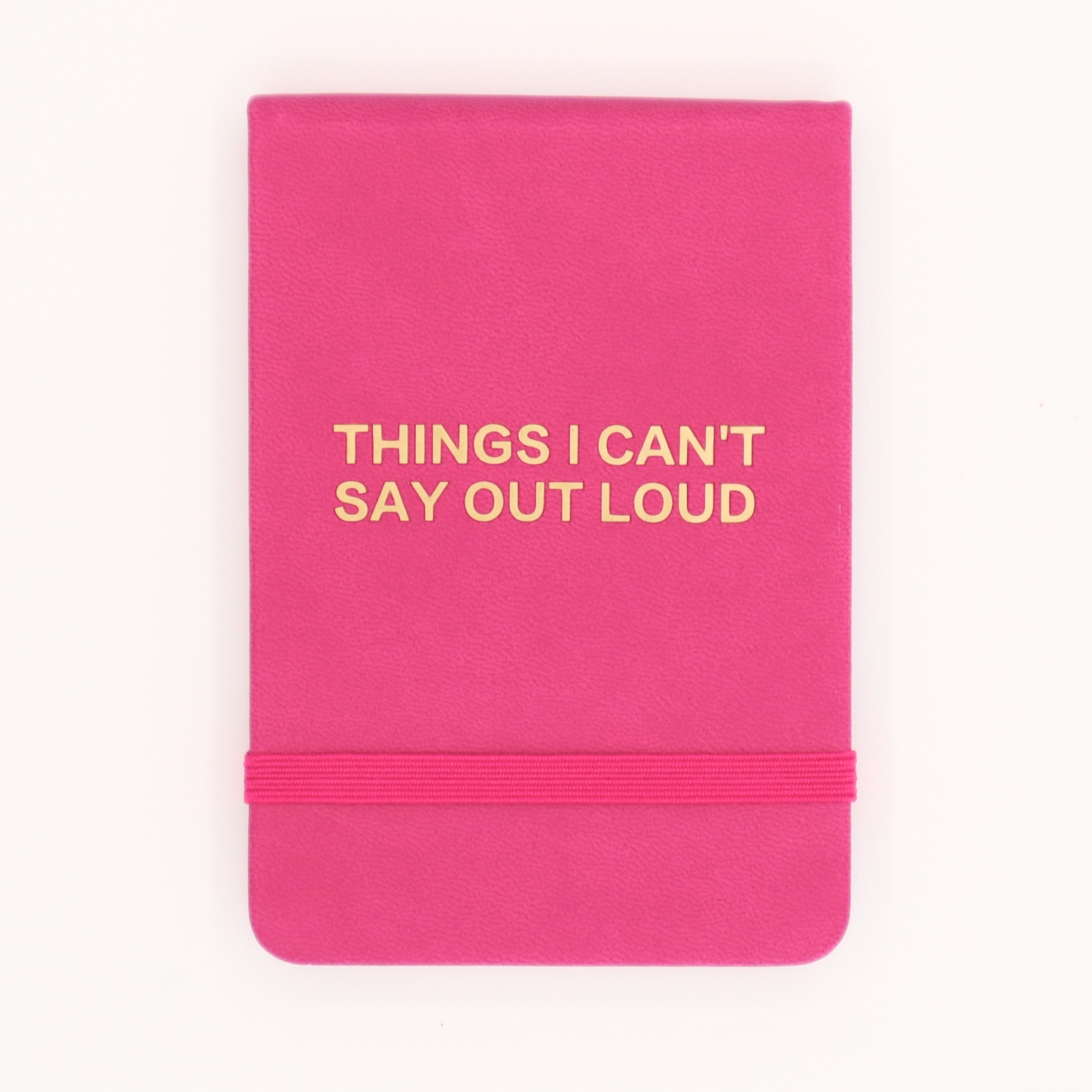 Pink notebook with 'THINGS I CAN'T SAY OUT LOUD' text on a white background