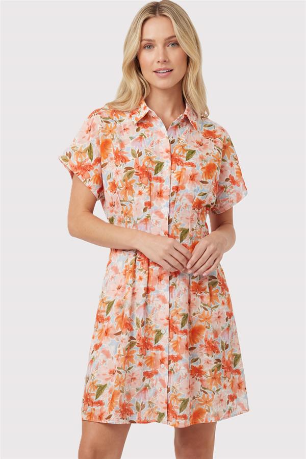 Woman wearing a floral dress on a white background