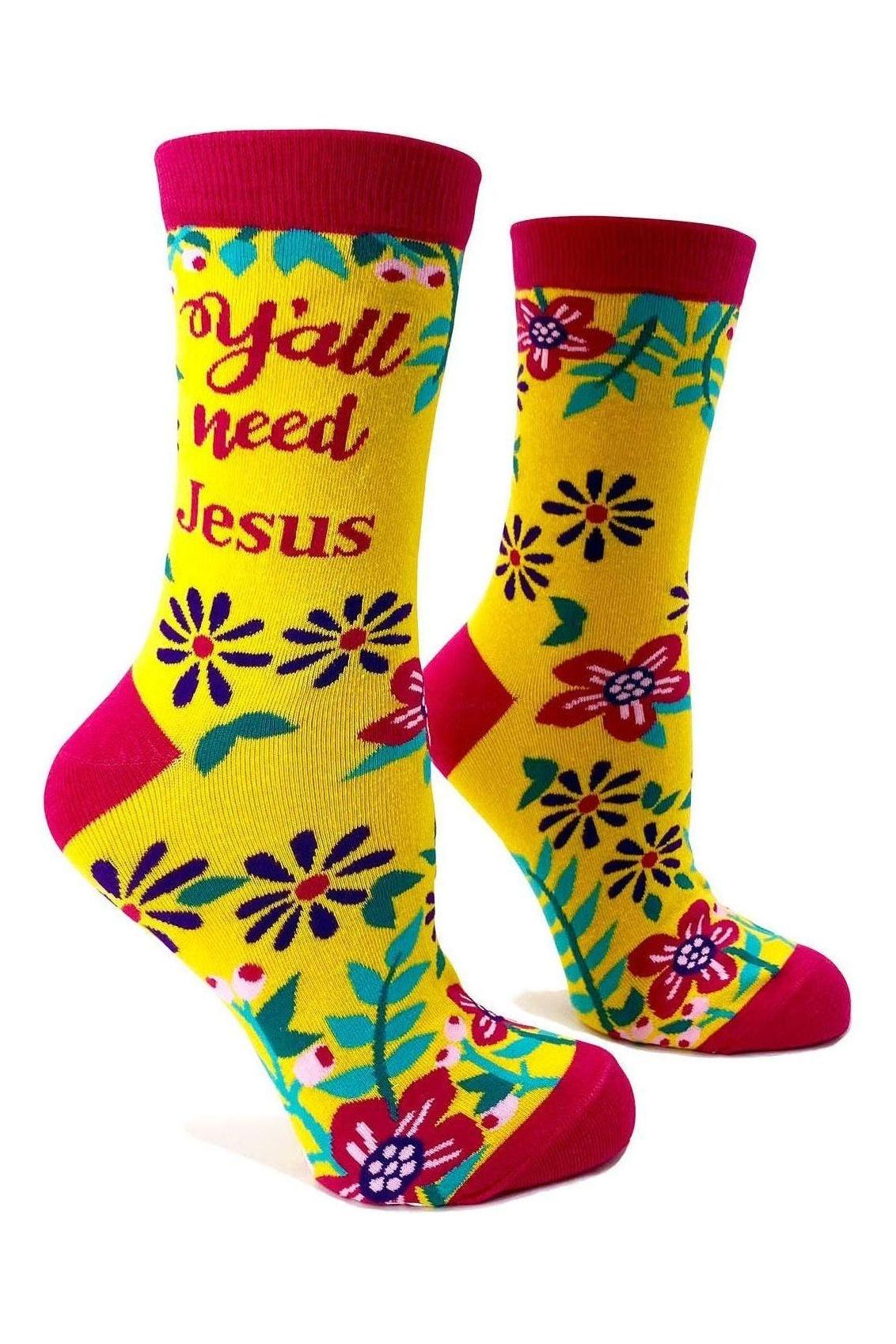 Colorful socks with floral patterns and text on a white background