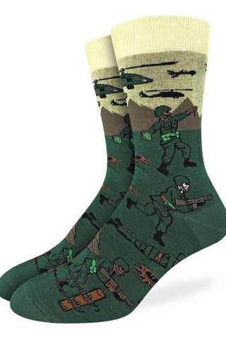 Green military-themed socks with soldier and helicopter design on a white background