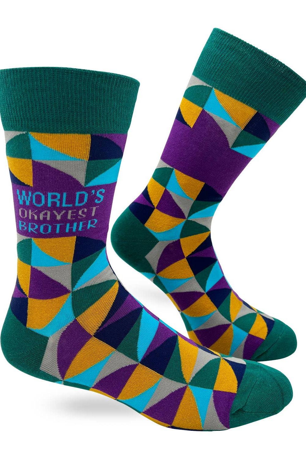 Colorful socks with geometric pattern and 'World's Okayest Brother' text on a white background