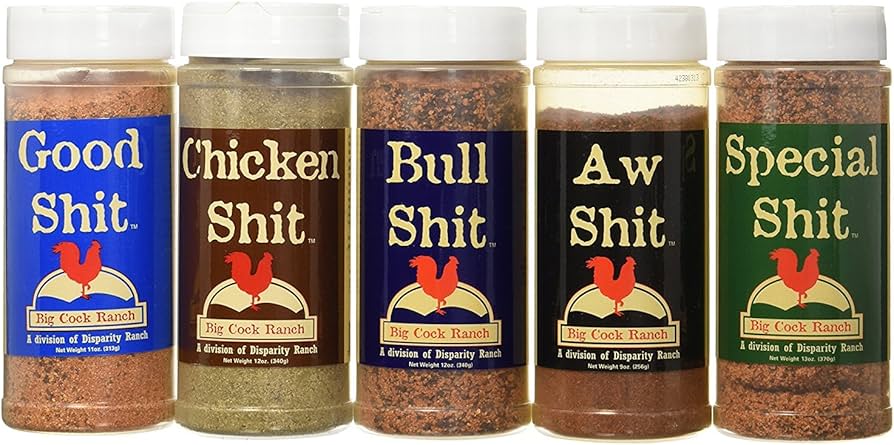 Five containers of Big Cock Ranch seasoning with colorful labels.