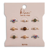 Set of hair tie rings on a branded card with 'klani' and 'terra' branding.