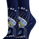 Blue socks with don't be a salty bitch writing

