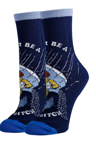 Blue socks with don't be a salty bitch writing
