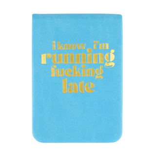 Blue notebook with gold text on a white background