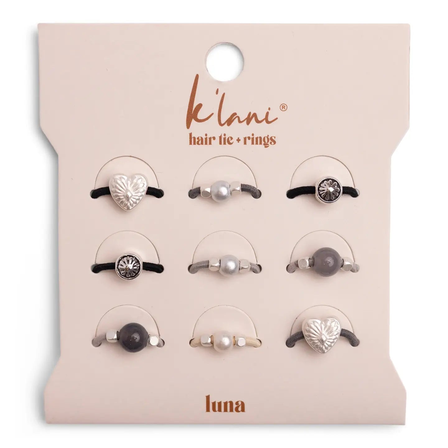 Set of hair tie and ring accessories on a 'klani' branded card.