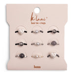 Set of hair tie and ring accessories on a 'klani' branded card.