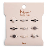 Set of hair tie and ring accessories on a 'klani' branded card.