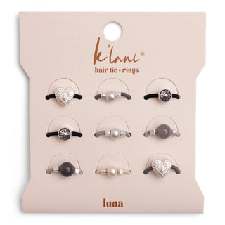 Set of hair tie and ring accessories on a 'klani' branded card.