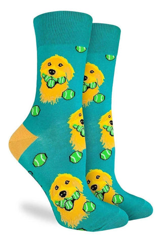 Teal socks with a pattern of a dog holding tennis balls on a white background