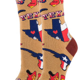 A pair of women's cotton crew socks with a novelty Texas design, featuring red and blue colors and the word 'Texas' on a light brown background.