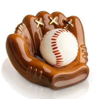 Baseball in a brown glove on a white background