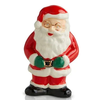  ceramic Santa Claus figurine on a white background
