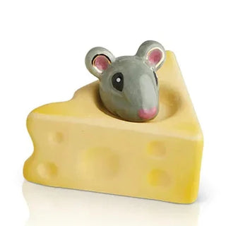 Toy mouse on a block of cheese with a white background