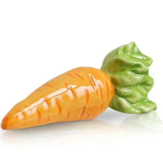 Carrot-shaped object with a green top on a white background