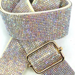 Sparkling belt with a gold buckle on a white background