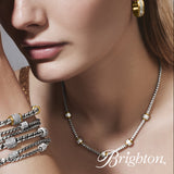 Woman wearing Brighton Meridian Petite jewelry with a focus on bracelets and necklace.