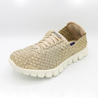 Beige woven sneaker with white sole on a light gray background