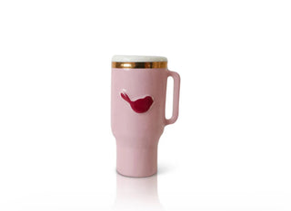 Pink travel mug with a red heart design on a white background