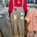 Striped overalls with cherry embroidery on a white background