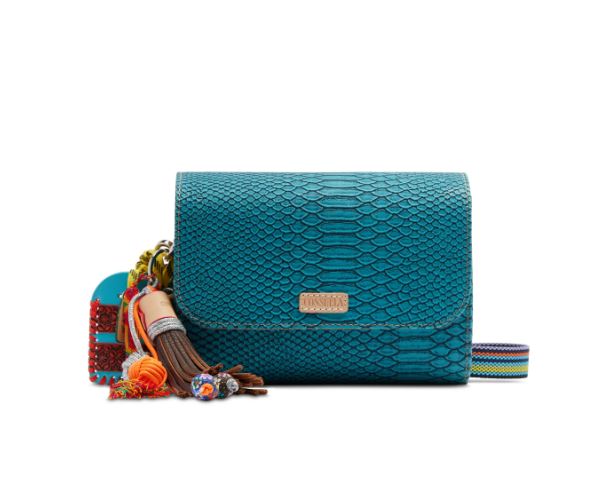 Teal handbag with colorful tassels on a white background