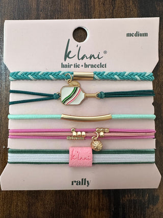 Set of hair tie and bracelets on a display card with 'klani' branding.