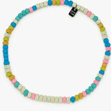 Colorful beaded necklace on a white background